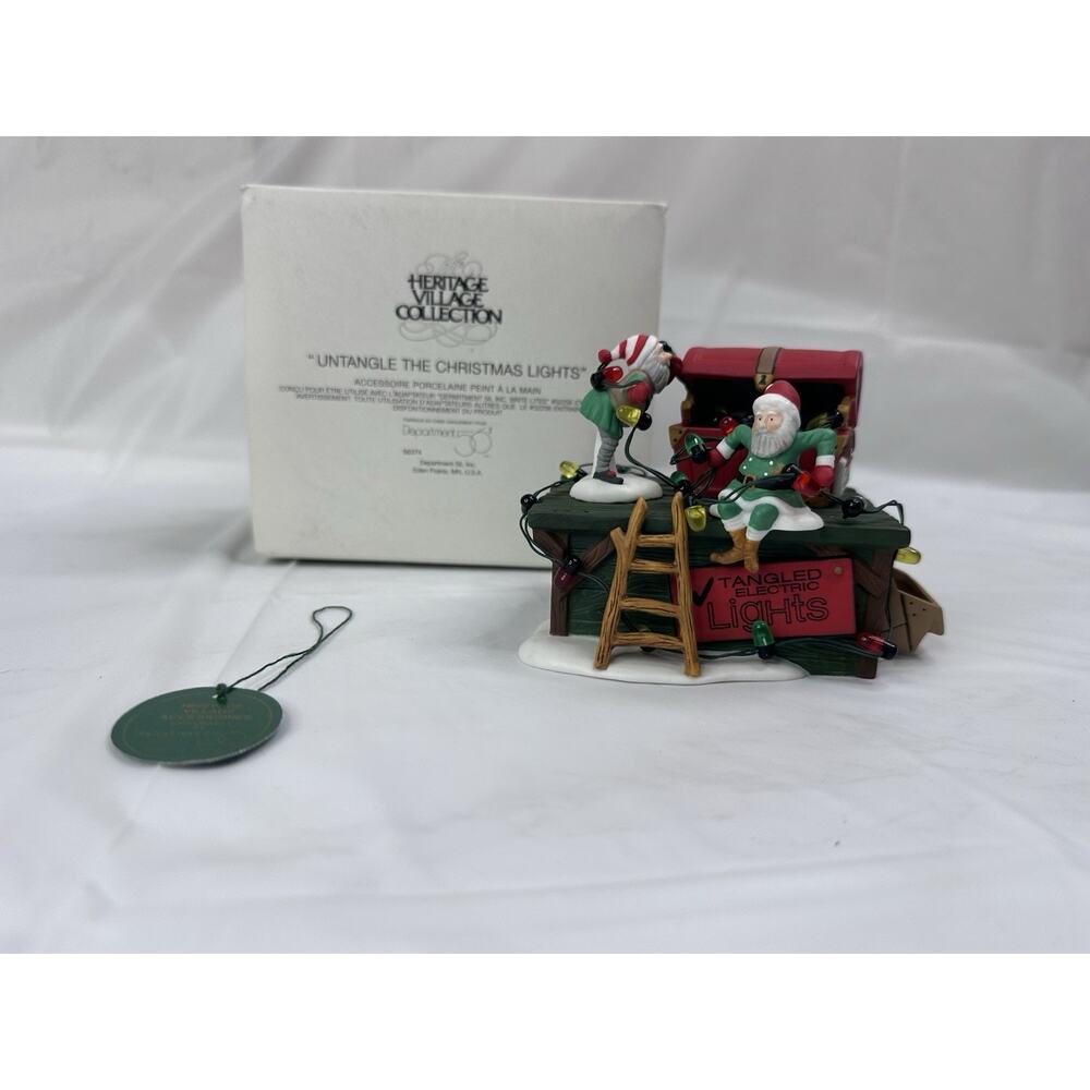 Dept 56 Heritage Village "UNTANGLE THE CHRISTMAS LIGHTS" #56374